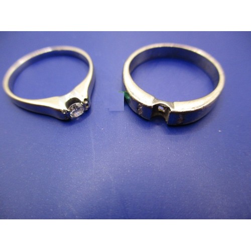 12 - Two 18ct white gold rings, approx. combined weight 5.9g both having stones deficient and well used, ... 