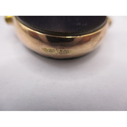 98 - A 9ct gold cased wrist watch marked Rolex to inside and a 9ct hard stone fob, watch has crack to dia... 