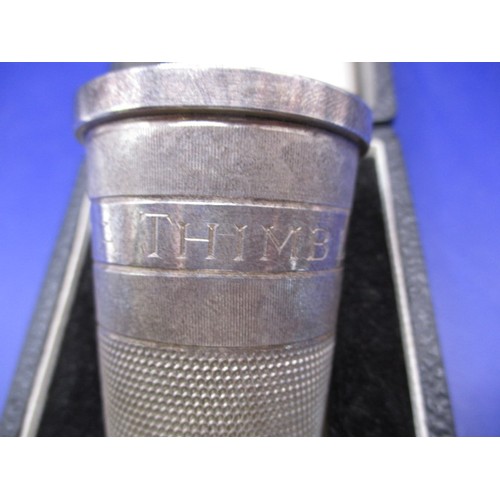 142 - A sterling silver shot cup in the form of a thimble, approx. length 5.2cm approx. diameter 4cm in or... 