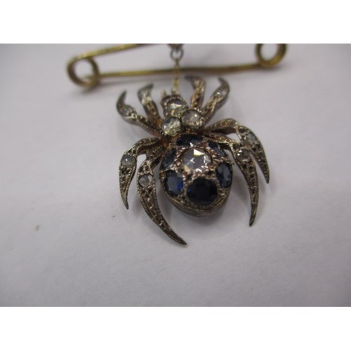 85 - An antique insect brooch of a spider and fly, the pin marked 9ct gold with the spider and fly set wi... 