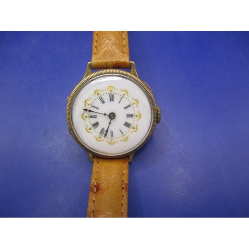 101 - A 1940s 9ct gold cased wrist watch, runs when wound, inscription to back dated 1941, having use rela... 