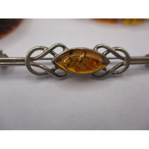 116 - A vintage genuine amber bead bracelet and a silver bar brooch with amber bead, and another piece of ... 