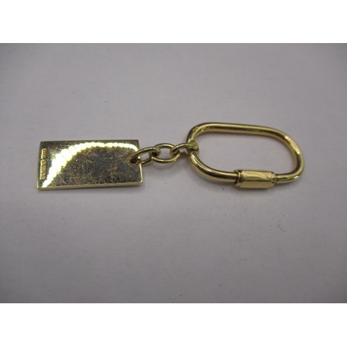 90 - An 18ct yellow gold key holder, approx. weight 17.8g in good near unused condition