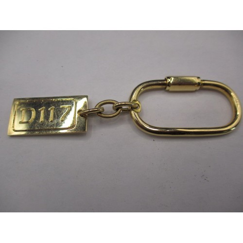 90 - An 18ct yellow gold key holder, approx. weight 17.8g in good near unused condition