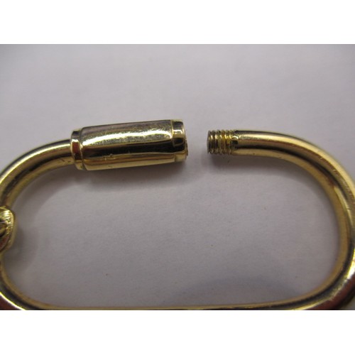 90 - An 18ct yellow gold key holder, approx. weight 17.8g in good near unused condition