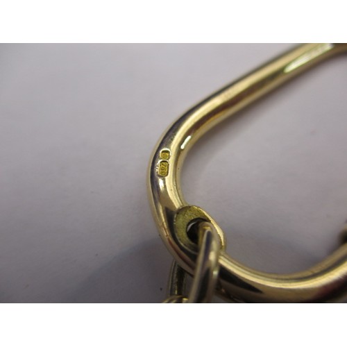 90 - An 18ct yellow gold key holder, approx. weight 17.8g in good near unused condition