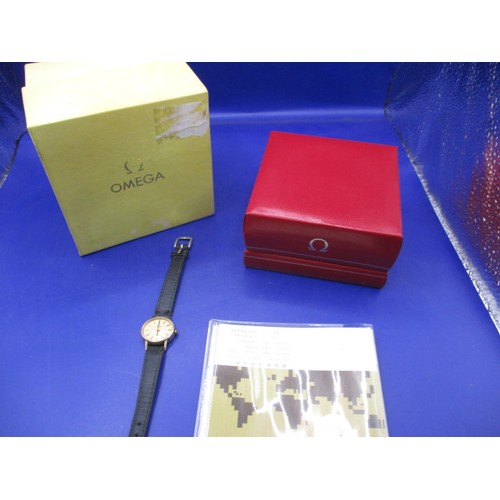 102 - A 1970s yellow metal cased Omega watch with original box and paperwork, not tested as to function