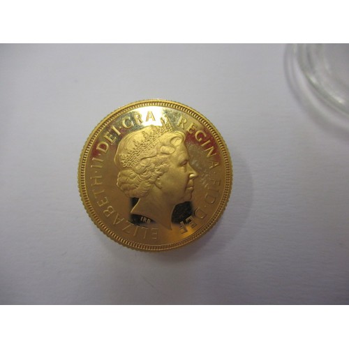 128 - A 1999 proof gold sovereign with certificate and presentation box