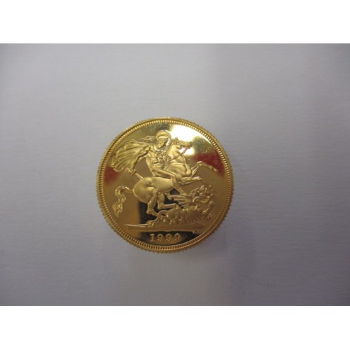 128 - A 1999 proof gold sovereign with certificate and presentation box