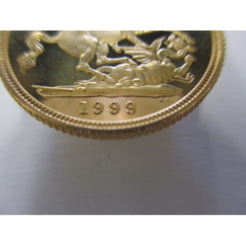 128 - A 1999 proof gold sovereign with certificate and presentation box