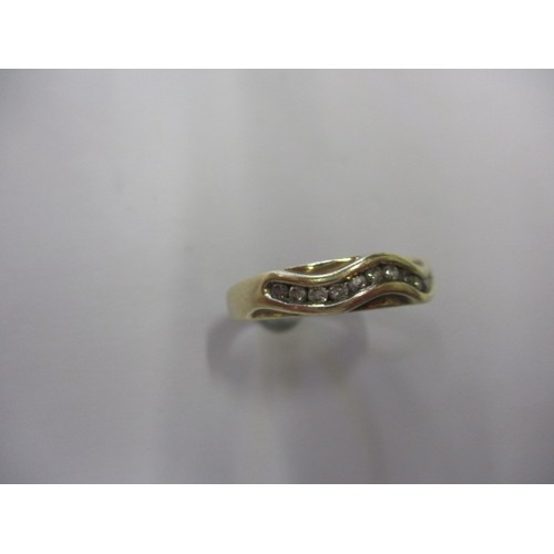 46 - A 9ct yellow gold diamond serpentine ring, approx. ring size ‘P+’, approx. weight 3.7g in good pre-o... 