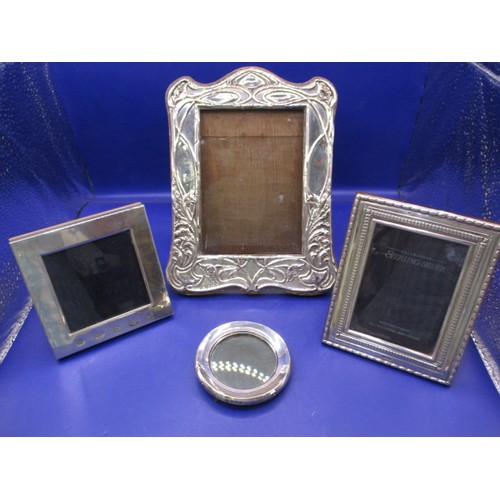 157 - 4 Sterling silver photo frames, various dates and sizes, some minor denting and backs to some are lo... 