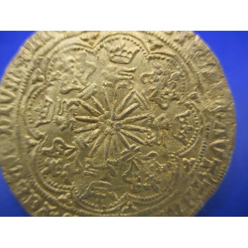 129 - An Edward IV gold rose Noble/Ryal, London mint, type VII (1466-7) the obverse crowned king in ship w... 