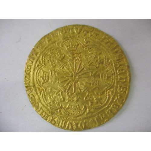 129 - An Edward IV gold rose Noble/Ryal, London mint, type VII (1466-7) the obverse crowned king in ship w... 