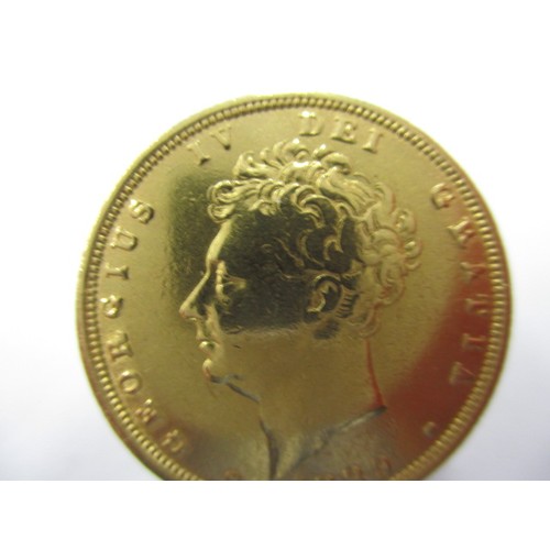 123 - A George IV full gold sovereign dated 1829 having shield back, a circulated coin with good definitio... 