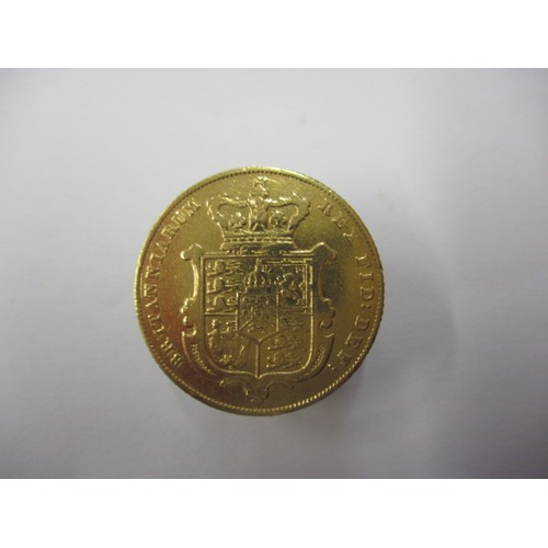 123 - A George IV full gold sovereign dated 1829 having shield back, a circulated coin with good definitio... 