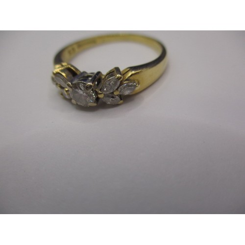 19 - A vintage 18ct yellow gold 7 stone diamond ring, having a central stone and each shoulder set with 3... 