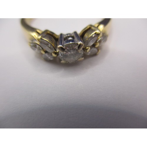 19 - A vintage 18ct yellow gold 7 stone diamond ring, having a central stone and each shoulder set with 3... 