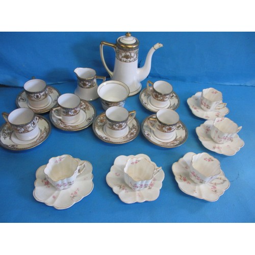 63 - A Noritake coffee set and another antique part set, in used condition with the cream jug and one cup... 