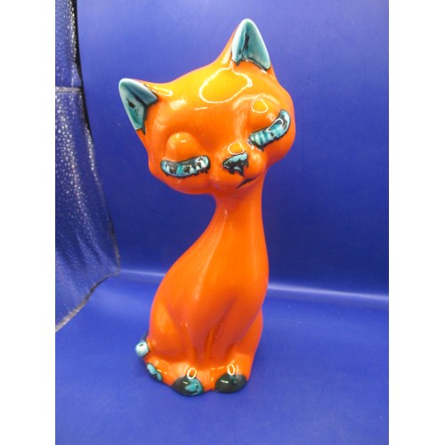 68 - An Irish porcelain rhinoceros and an orange glazed cat figure, both in good pre-owned condition with... 