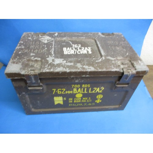 77 - A vintage military steel munitions box, having original stencilled information, in used condition wi... 