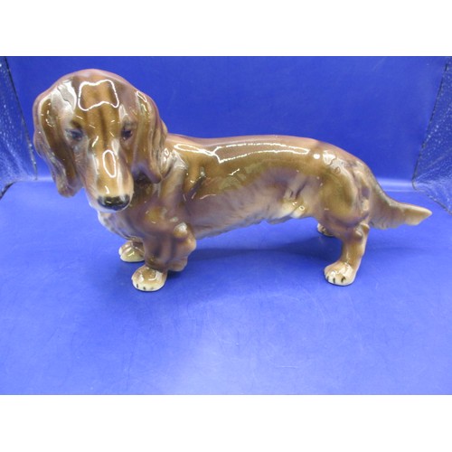 84 - A Royal Belvedere porcelain dachshund, approx. length 22cm in good used condition with use-related m... 