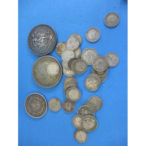 92 - A parcel of Victorian and later coins to include silver examples and collectors sets