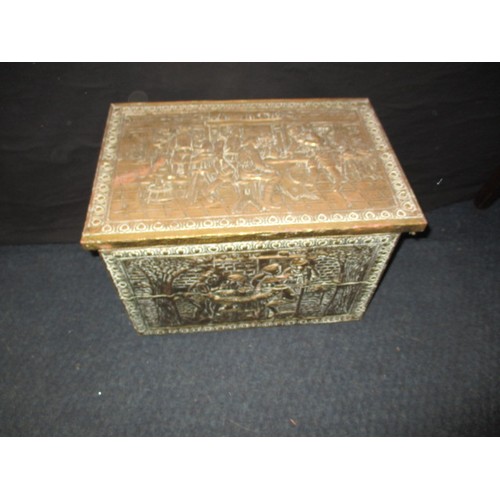 95 - A vintage embossed brass log box, having use-related marks, approx. size 46x31x32cm