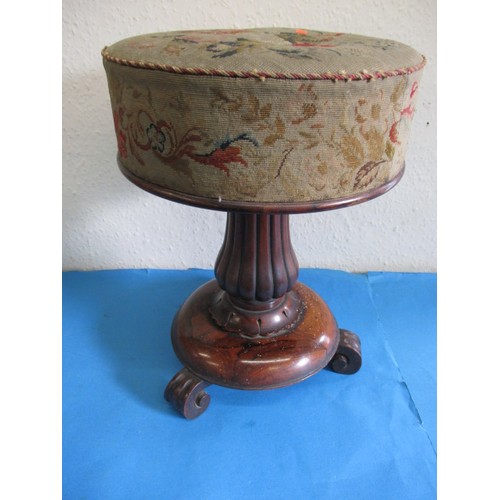 112 - A 19th century piano stool, with tulip column and tapestry pad, with general use related marks