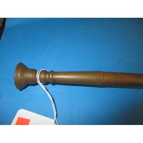 120 - A vintage copper hunting horn, of two part construction, in need of a clean, approx. length 125cm