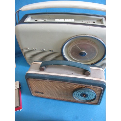 135 - A parcel of vintage portable radios, to include a 1960s  Perdio mini 66 with original clear case