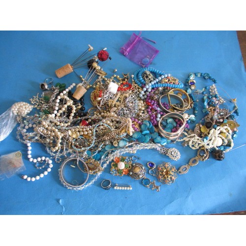 A quantity of vintage costume jewellery and hat pins, all in used condition some damages