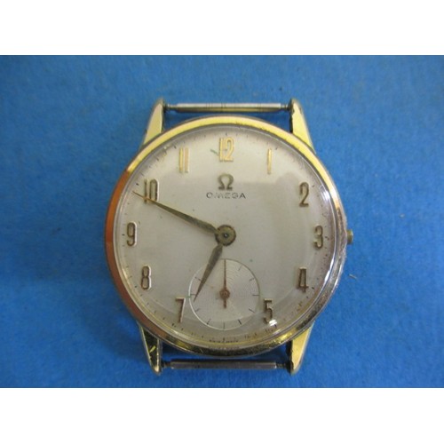 285 - A vintage Omega wrist watch, in used condition with strap or crown and not tested as to function, ap... 