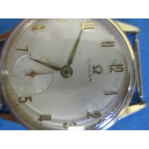 285 - A vintage Omega wrist watch, in used condition with strap or crown and not tested as to function, ap... 