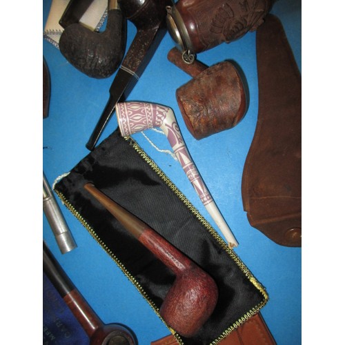 286 - A parcel of vintage pipes and accessories, all in used condition