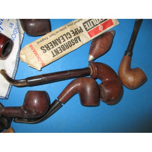 286 - A parcel of vintage pipes and accessories, all in used condition