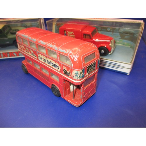 305 - Three vintage die-cast model vehicles to include a play worn Corgi London Routmaster double decker b... 