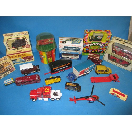 310 - A parcel of model vehicles, various makers and sizes, some in original boxes