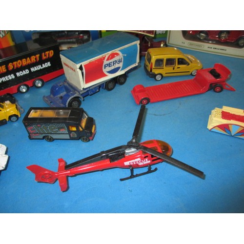 310 - A parcel of model vehicles, various makers and sizes, some in original boxes