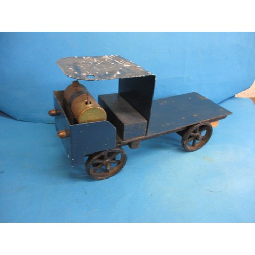 311 - A part model steam truck, having rolling chassis and boiler, scratch built, sold as a project in nee... 