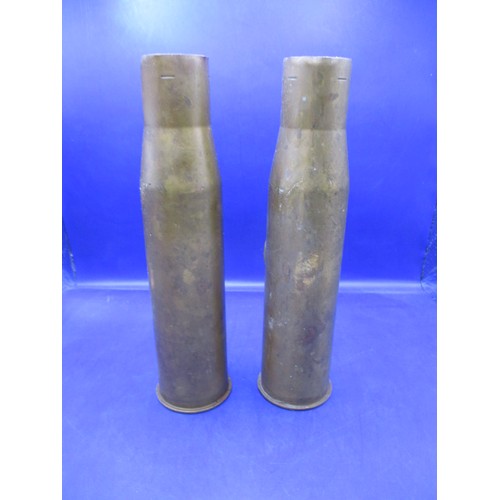 313 - Two WWII brass shell cases, both 37mm and dated 1942 & 1944, each with a tunic button attached, in g... 