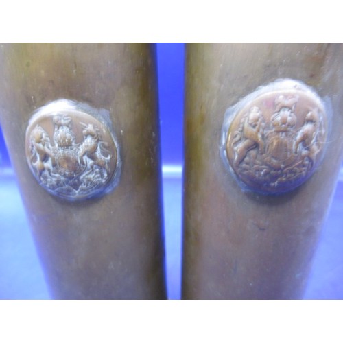 313 - Two WWII brass shell cases, both 37mm and dated 1942 & 1944, each with a tunic button attached, in g... 