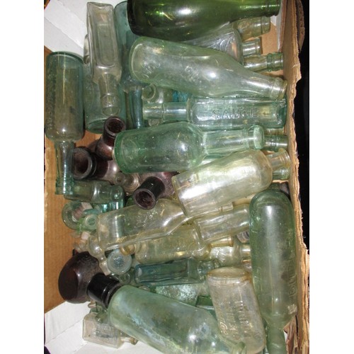 318 - A large quantity of antique and later bottles, all in used condition with age-related marks