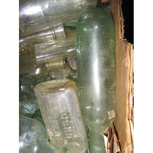 318 - A large quantity of antique and later bottles, all in used condition with age-related marks