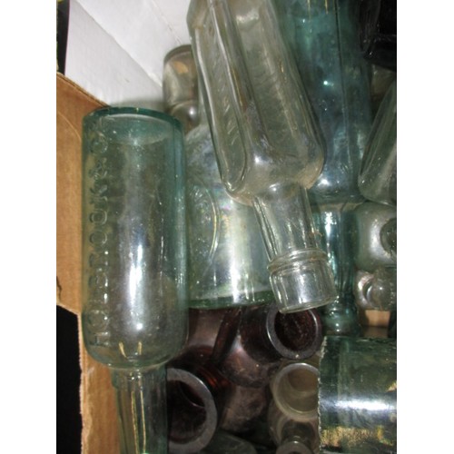 318 - A large quantity of antique and later bottles, all in used condition with age-related marks