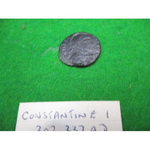 145 - A parcel of roman bronze coins and a George IIII 1821 silver crown, in glazed display cabinet, all c... 