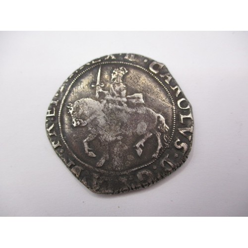 146 - A Charles I silver half crown, approx. weight 14.9g approx. dia 32mm being a clipped circulated coin... 