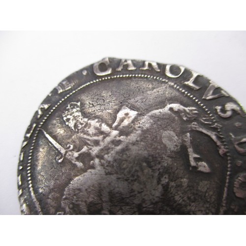 146 - A Charles I silver half crown, approx. weight 14.9g approx. dia 32mm being a clipped circulated coin... 