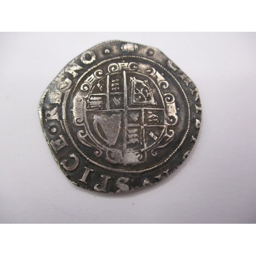 146 - A Charles I silver half crown, approx. weight 14.9g approx. dia 32mm being a clipped circulated coin... 