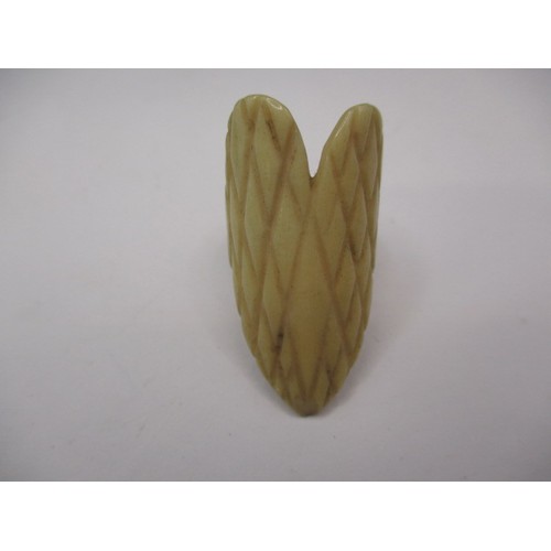 75 - A Victorian whale bone hair tidy, having hand carved decoration, approx. length 3.5cm in good antiqu... 